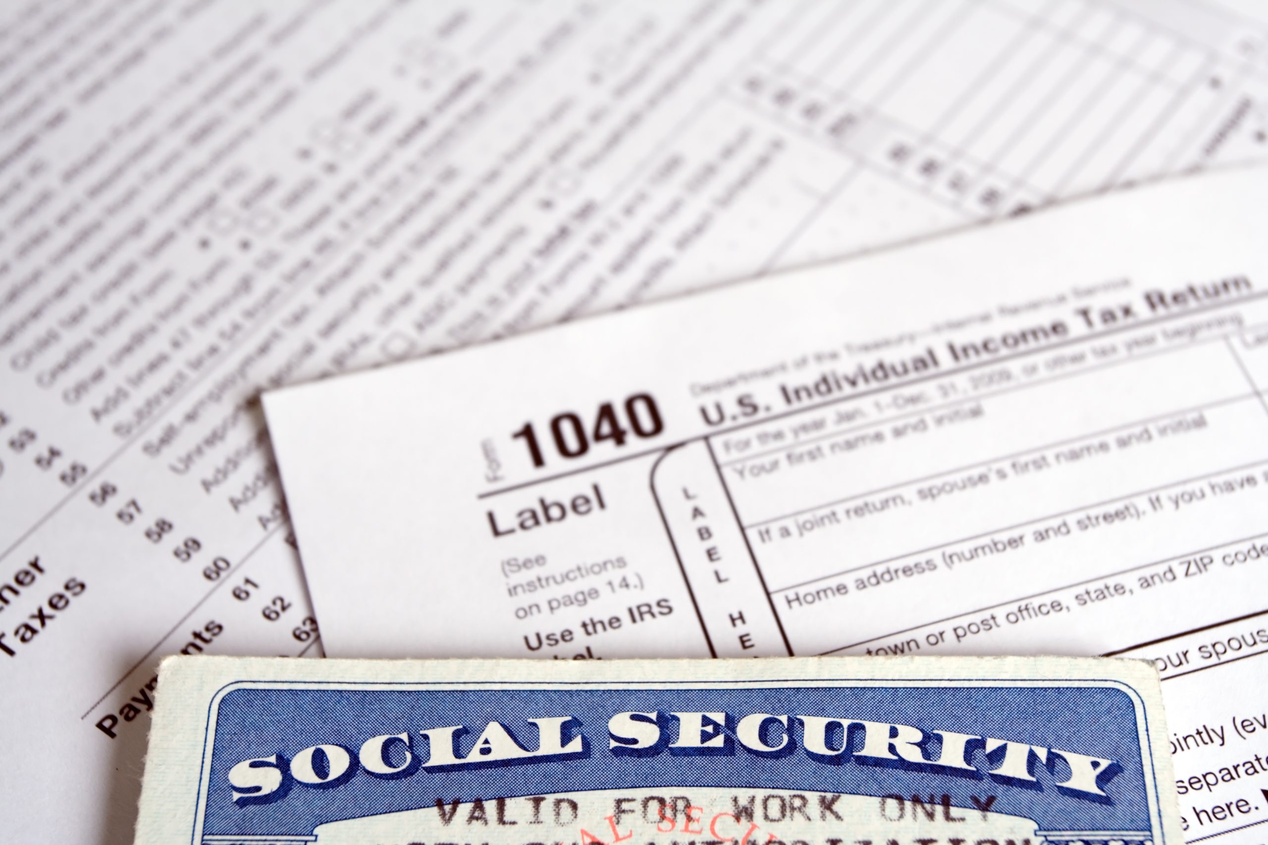 Tax forms and Social Security card as a business concept.